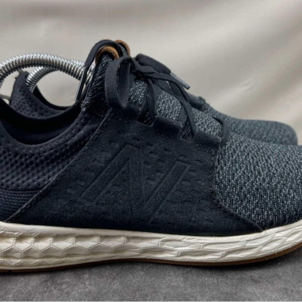 New Balance Black and White Sneakers with Mesh Upper and Lace-Up Design